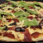Pizza with Prosciutto, Olives, Tomatoes, and Arugula - See more at: http://rebeccasinternationalkitchen.com/category/recipes-from-south-america/page/2/#sthash.bONEtAHk.dpuf